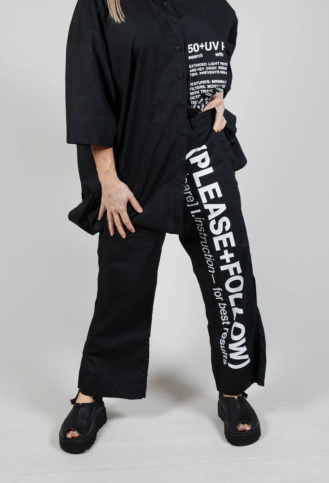 Wide Leg Trousers with Lettering Motif in Black Print